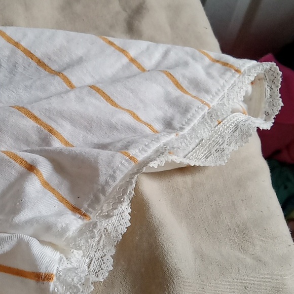 A medium sized American eagle shirt that is white with yellow strips - Picture 2 of 2